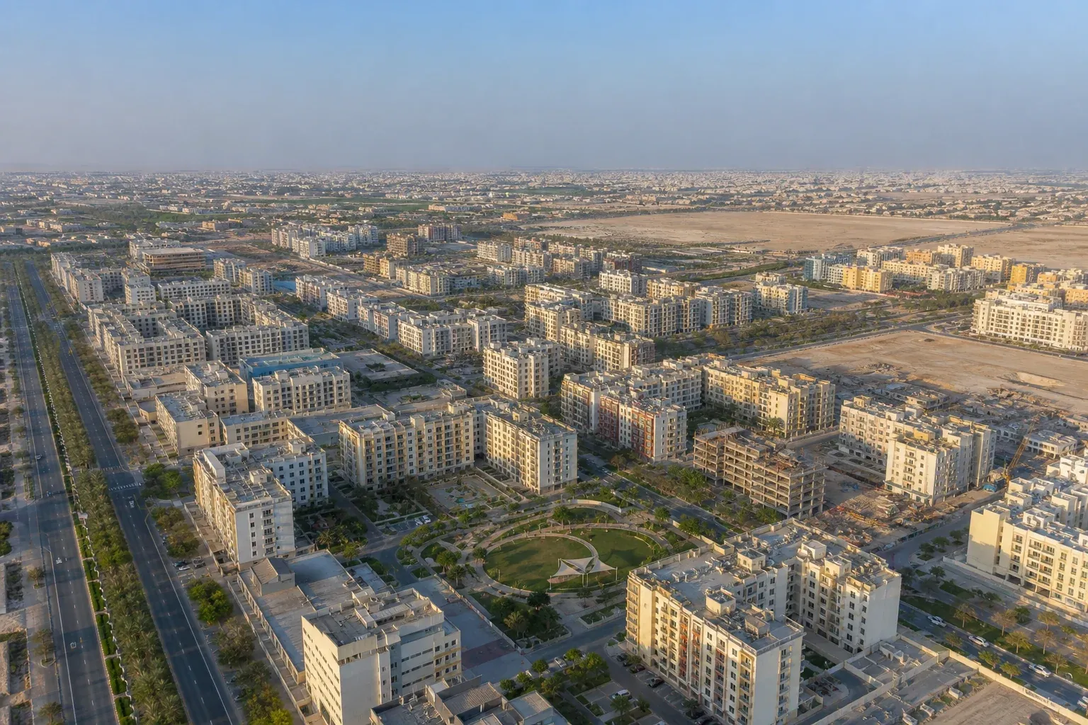 Illustrative aerial overview of apartment neighbourhoods and developing plots in Al Warsan 4, Dubai