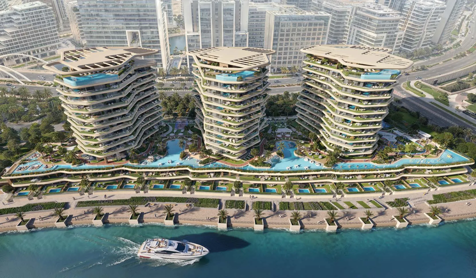 Aerial view of three waterfront towers at Bab Al Qasr Sea View Residence 51 in Al Raha Beach