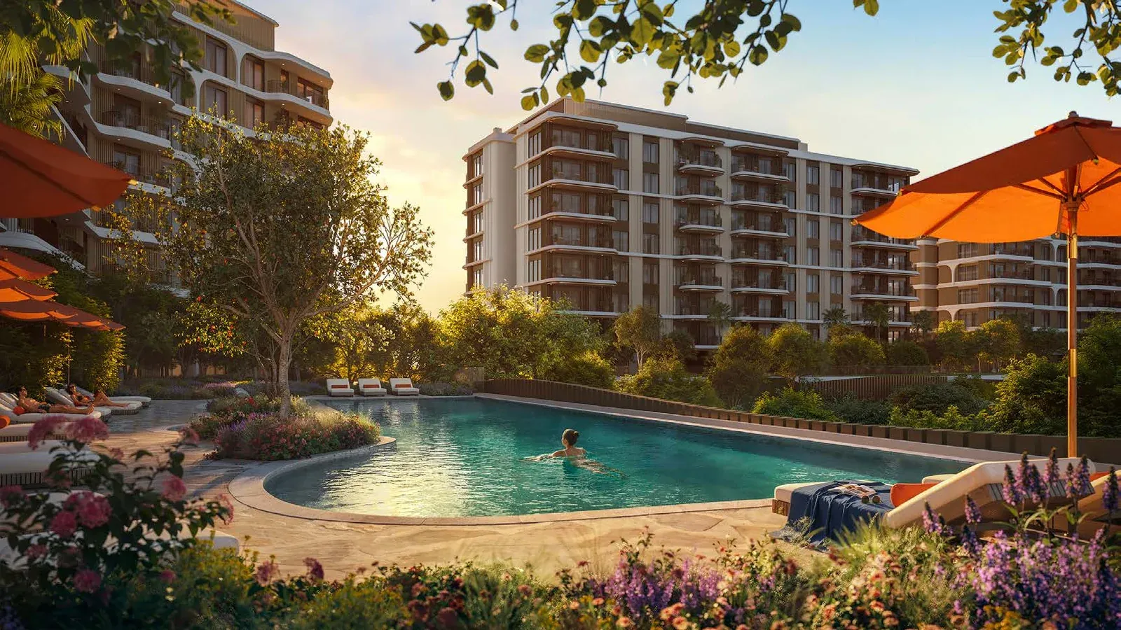 The Canopies at Yas Point resort-style pool surrounded by landscaped gardens and six mid-rise apartment buildings.
