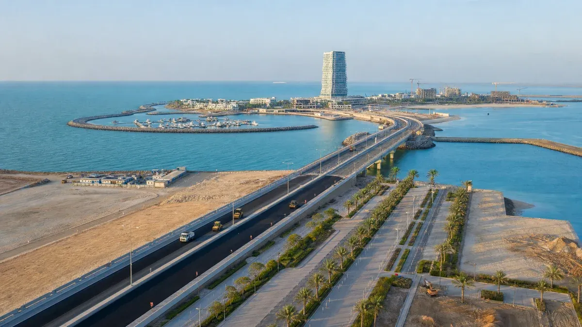 A new bridge and boulevard approach the developing resort island from the Ras Al Khaimah mainland.