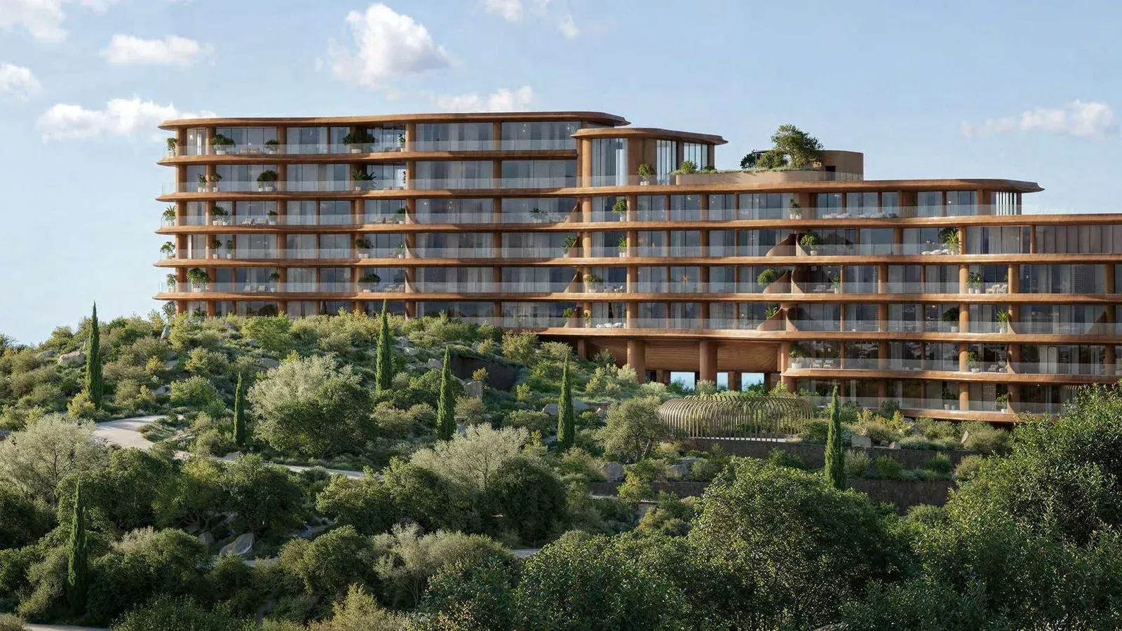Jumeirah Residences and landscaped coastal hills at La Mer, Dubai