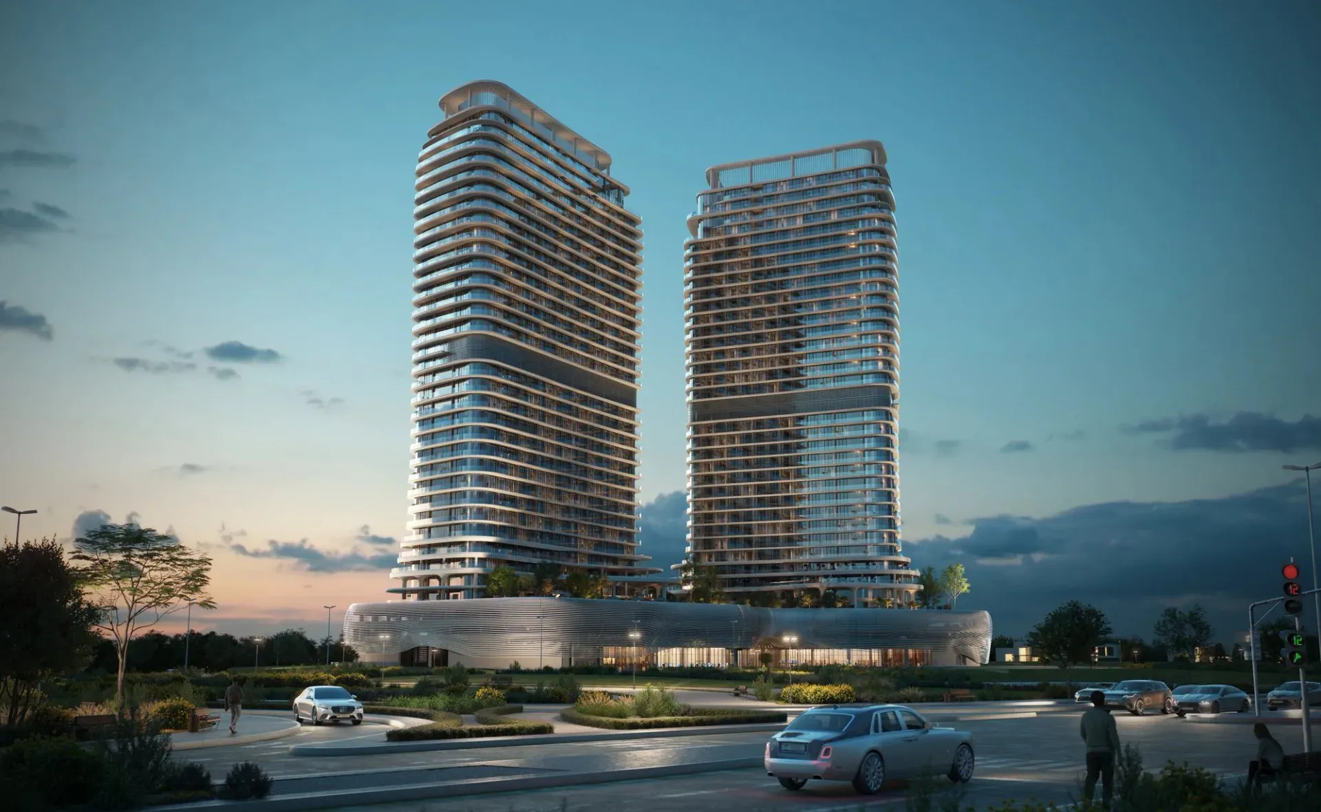 Twin curved towers of SAAS Hills at blue hour in Dubai Science Park