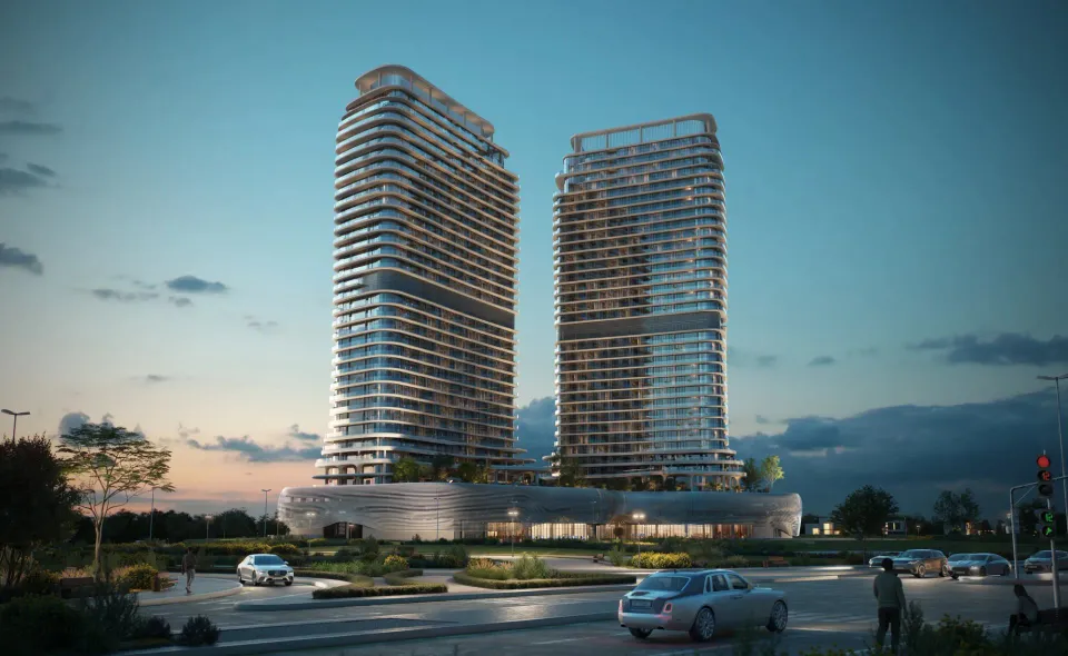Twin curved towers of SAAS Hills at blue hour in Dubai Science Park
