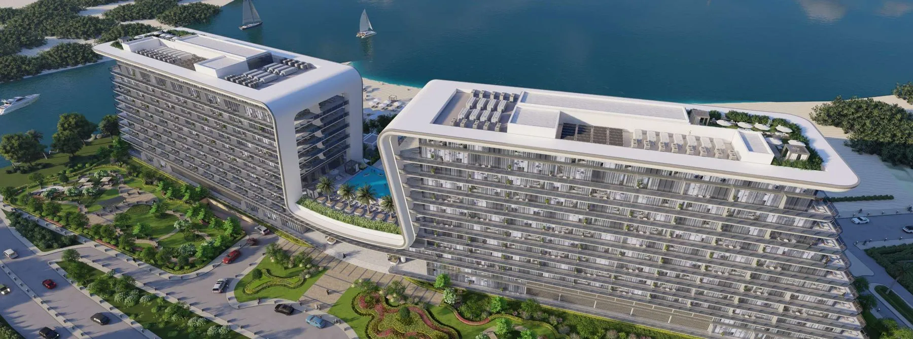 Aerial view of the two connected waterfront buildings at Yas Beach Residence on Yas Island