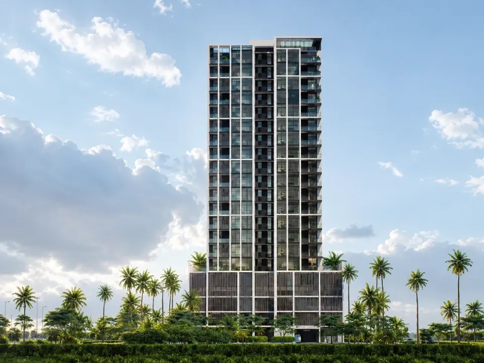 Contemporary SRG Properties residential tower framed by palm trees under a blue sky
